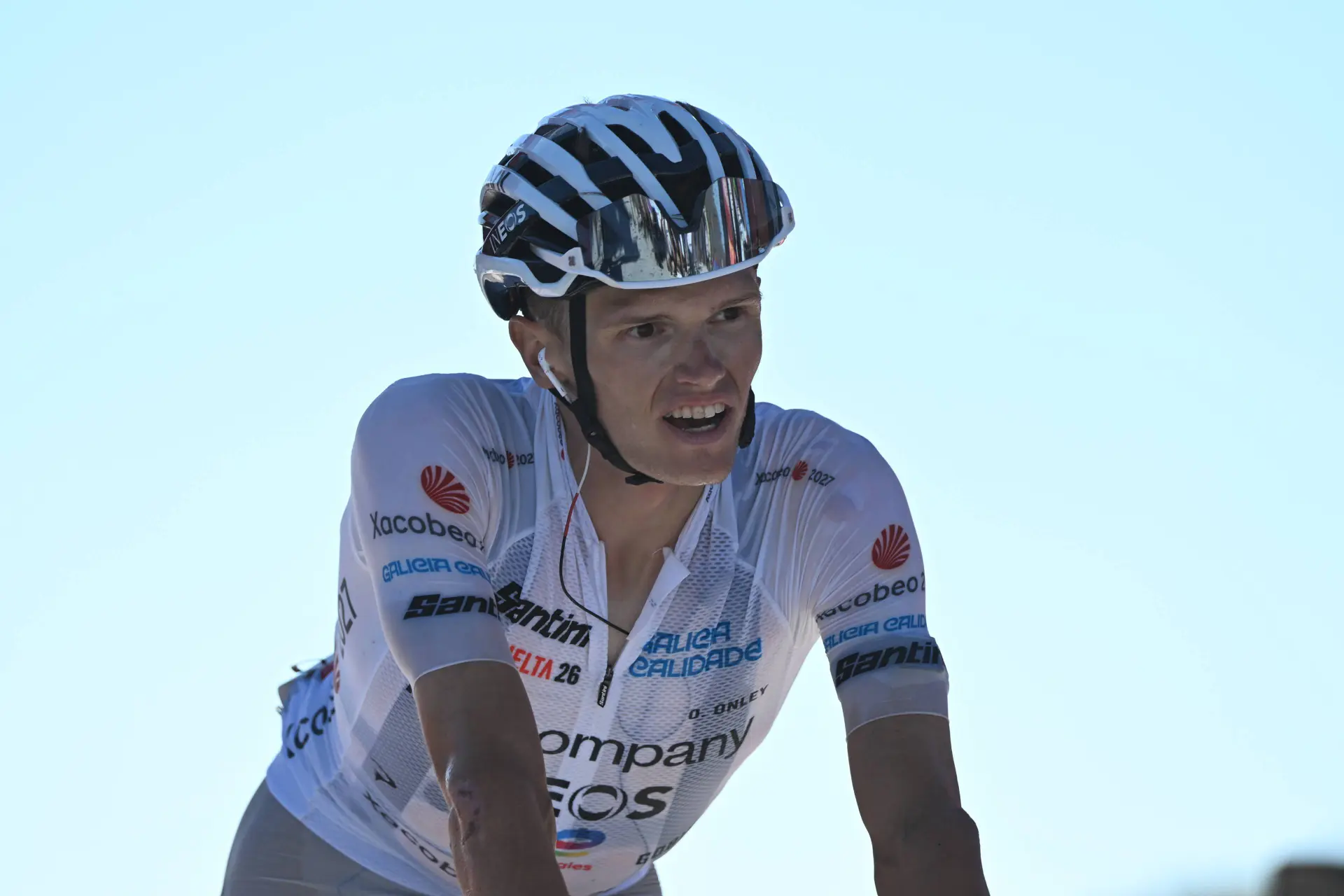 Oscar Onley crosses the line on Stage 20 of the 2026 Vuelta a Espana