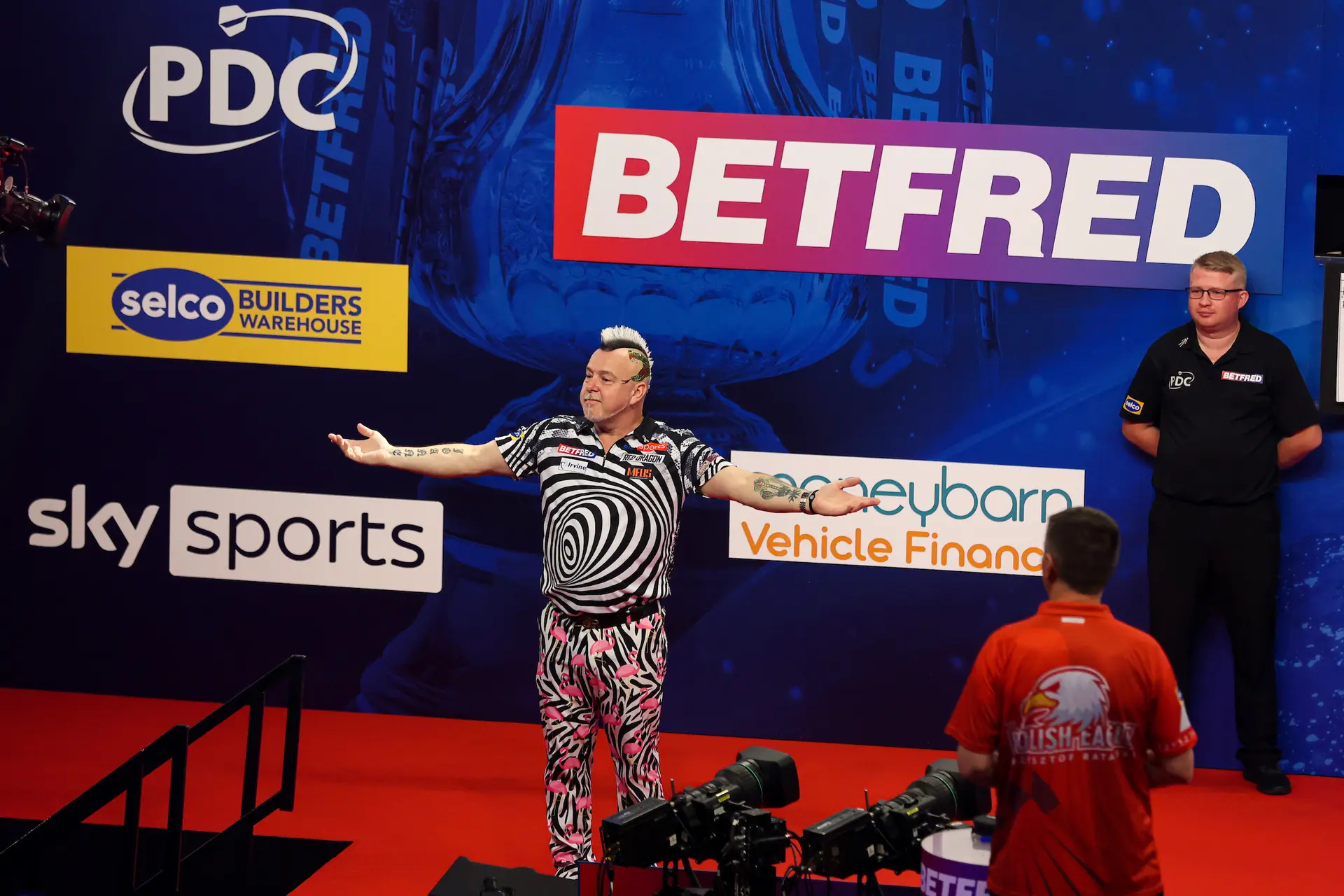 Defending champion Wright continues World Matchplay run after epic tie-break victory over Ratajski