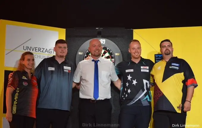 Top German players raise money at charity exhibition