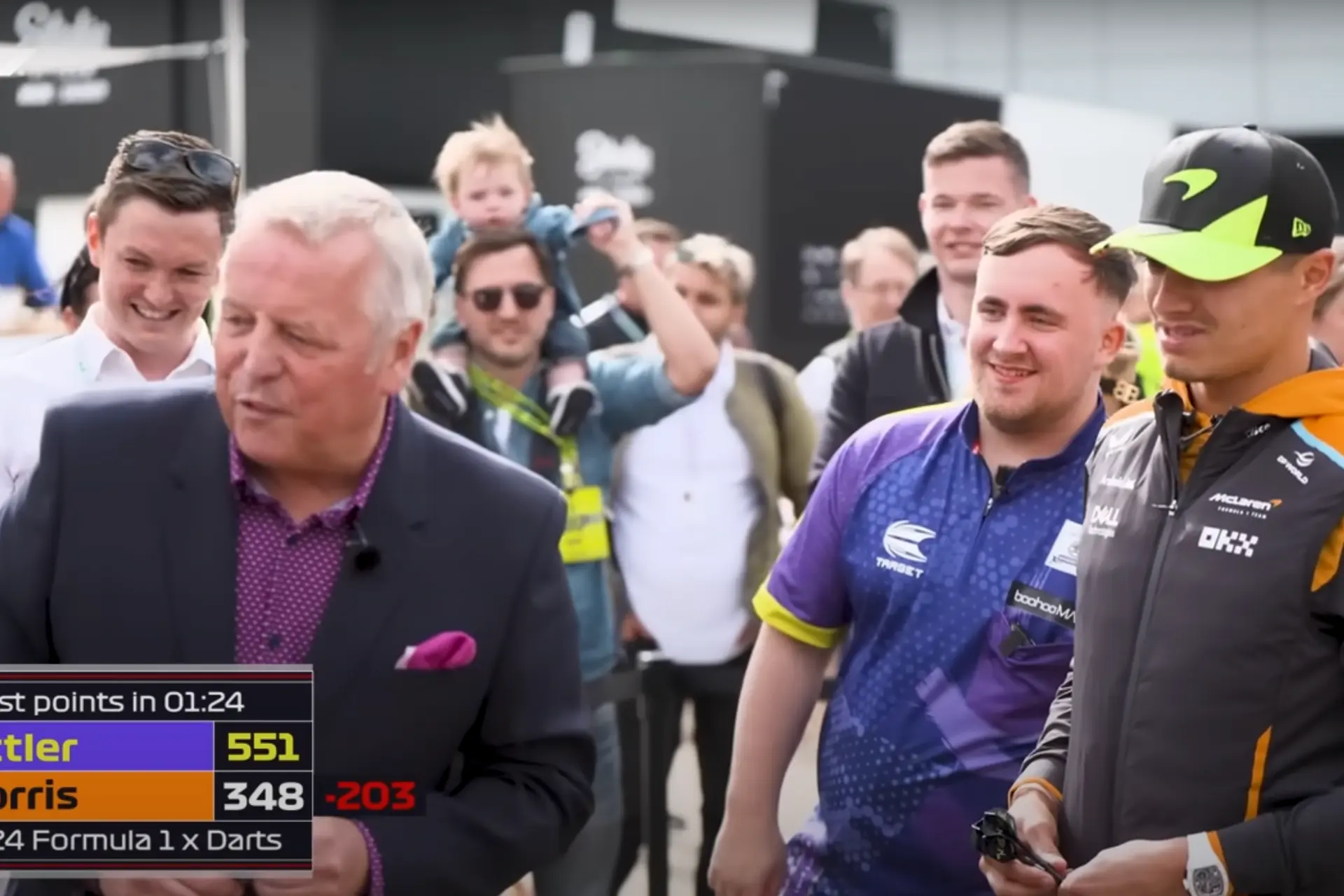 (VIDEO) Luke Littler challenges F1 grid to beat him at darts during British Grand Prix