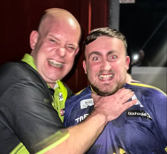 Michael van Gerwen playfully grabs Luke Littler by the throat after incredulous defeat in Prague