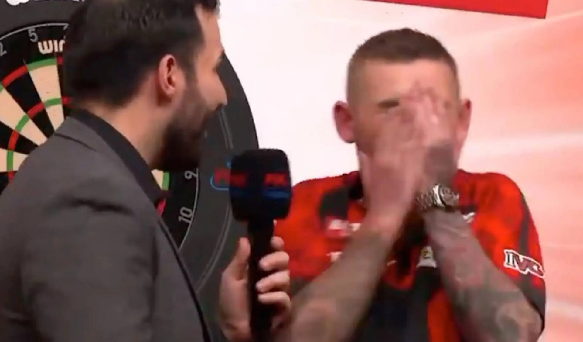 Nathan Aspinall left covering face in embarrassment moments after Euro Tour title win as host is forced to apologise