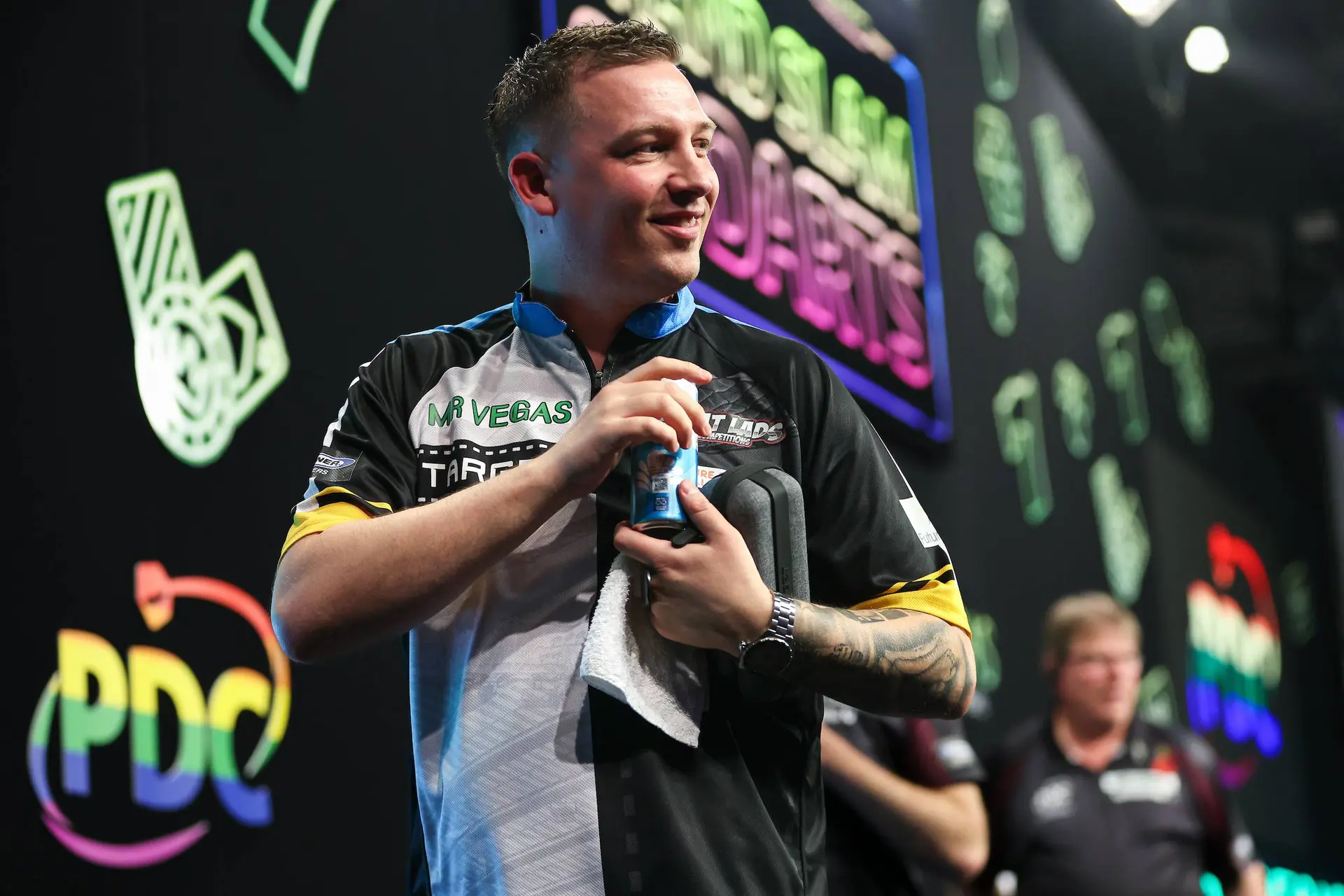 Chris Dobey smiling towards the crowd