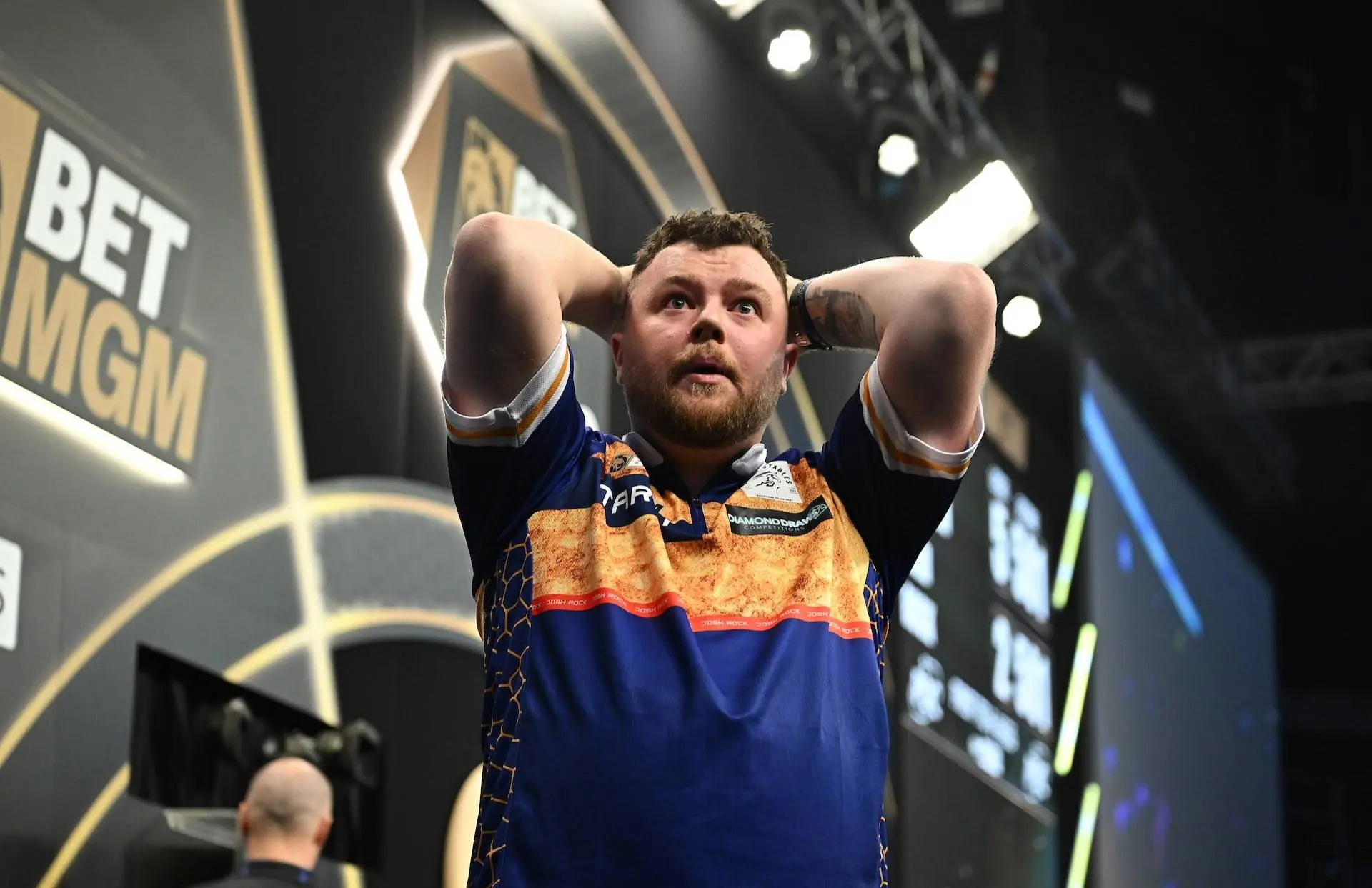 Josh Rock cannot believe he has just hit a nine-darter