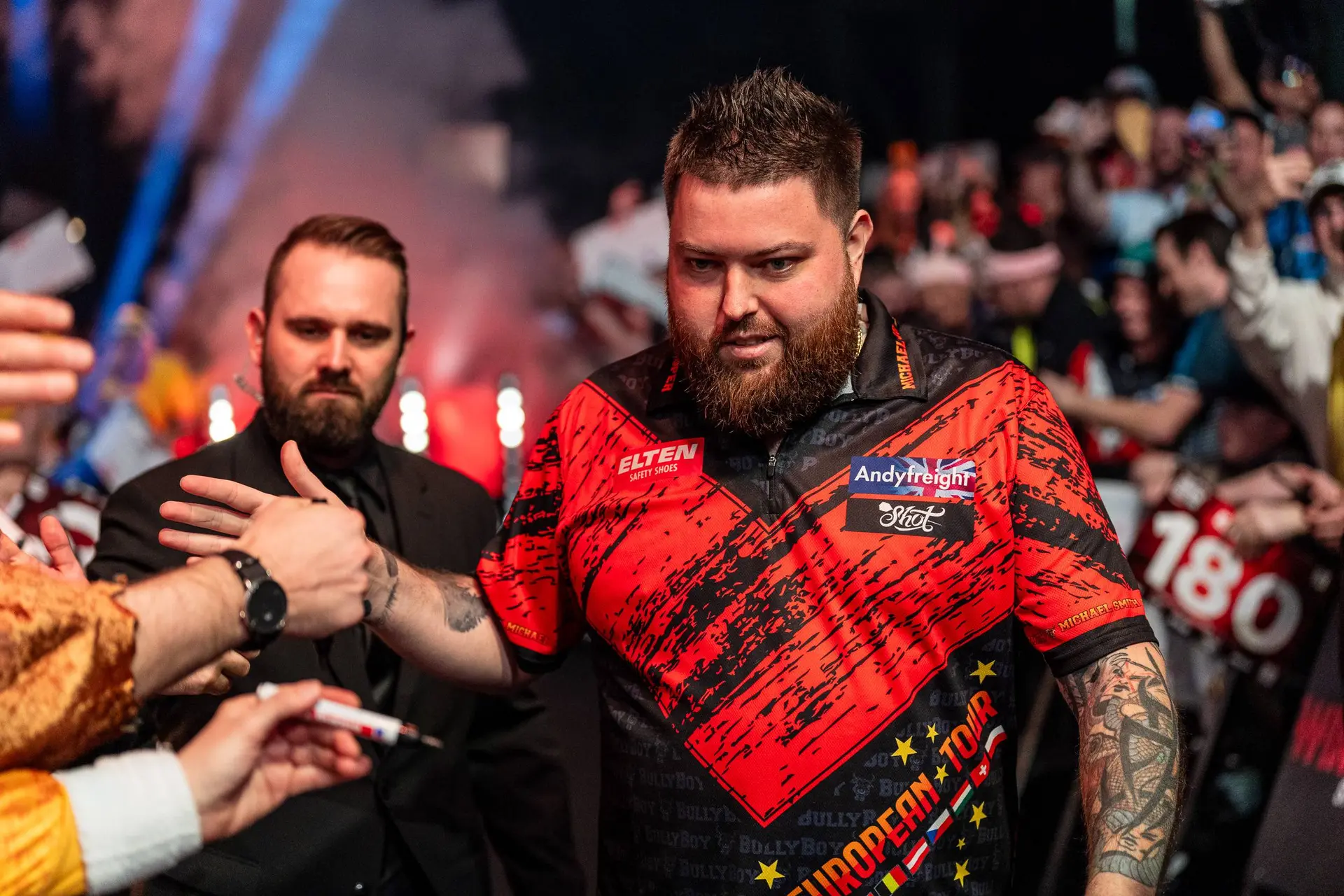 German Darts Grand Prix Sunday afternoon Round-Up | Michael Smith triumphs over Dave Chisnall in session of deciding leg drama