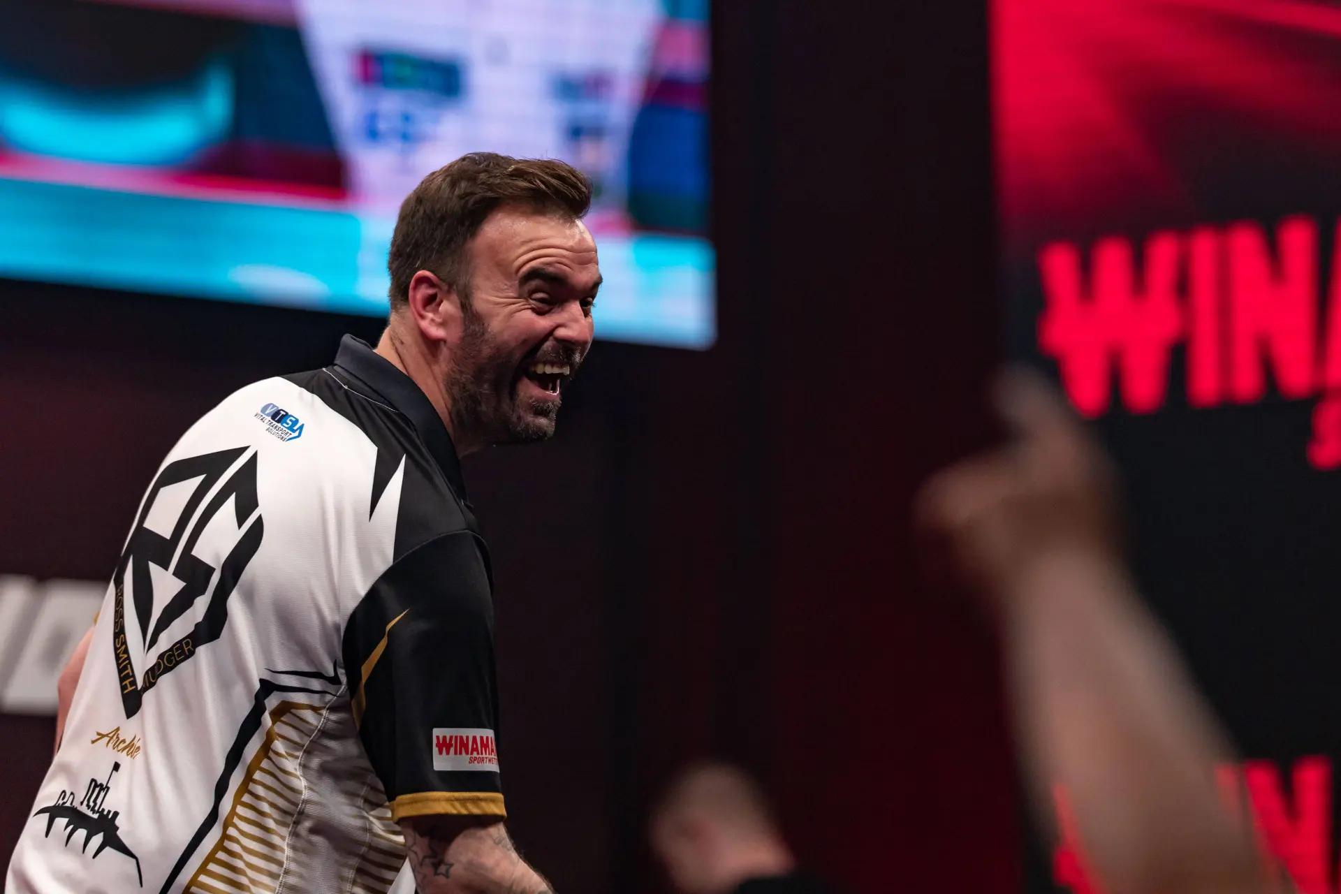 Ross Smith celebrating on stage