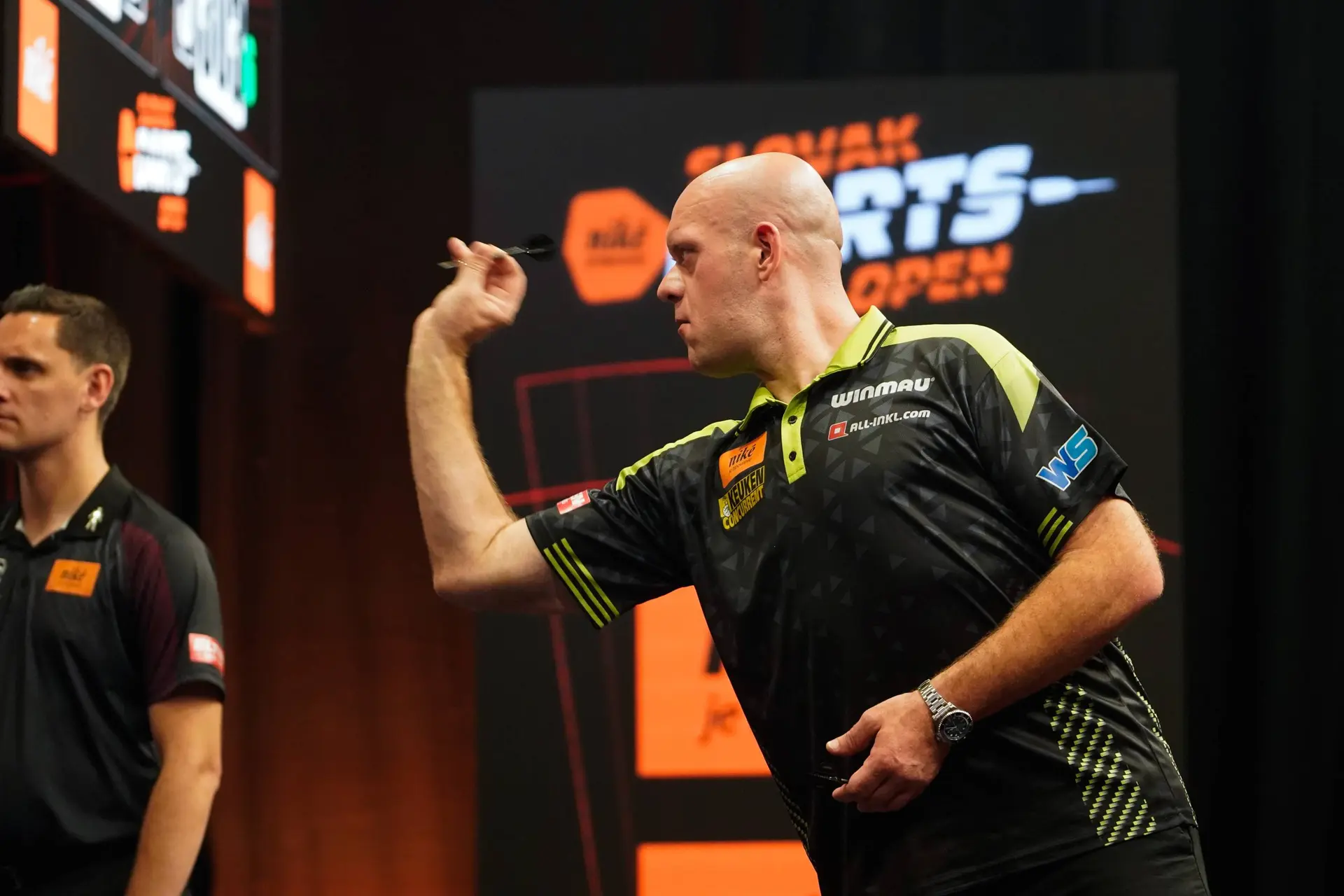 Michael van Gerwen throws dart.