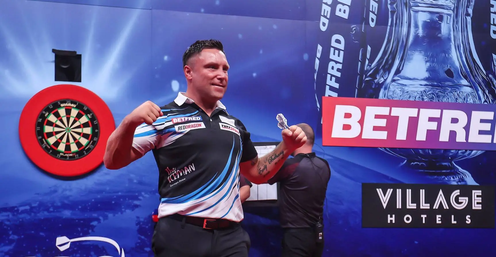 Gerwyn Price pumps his fists
