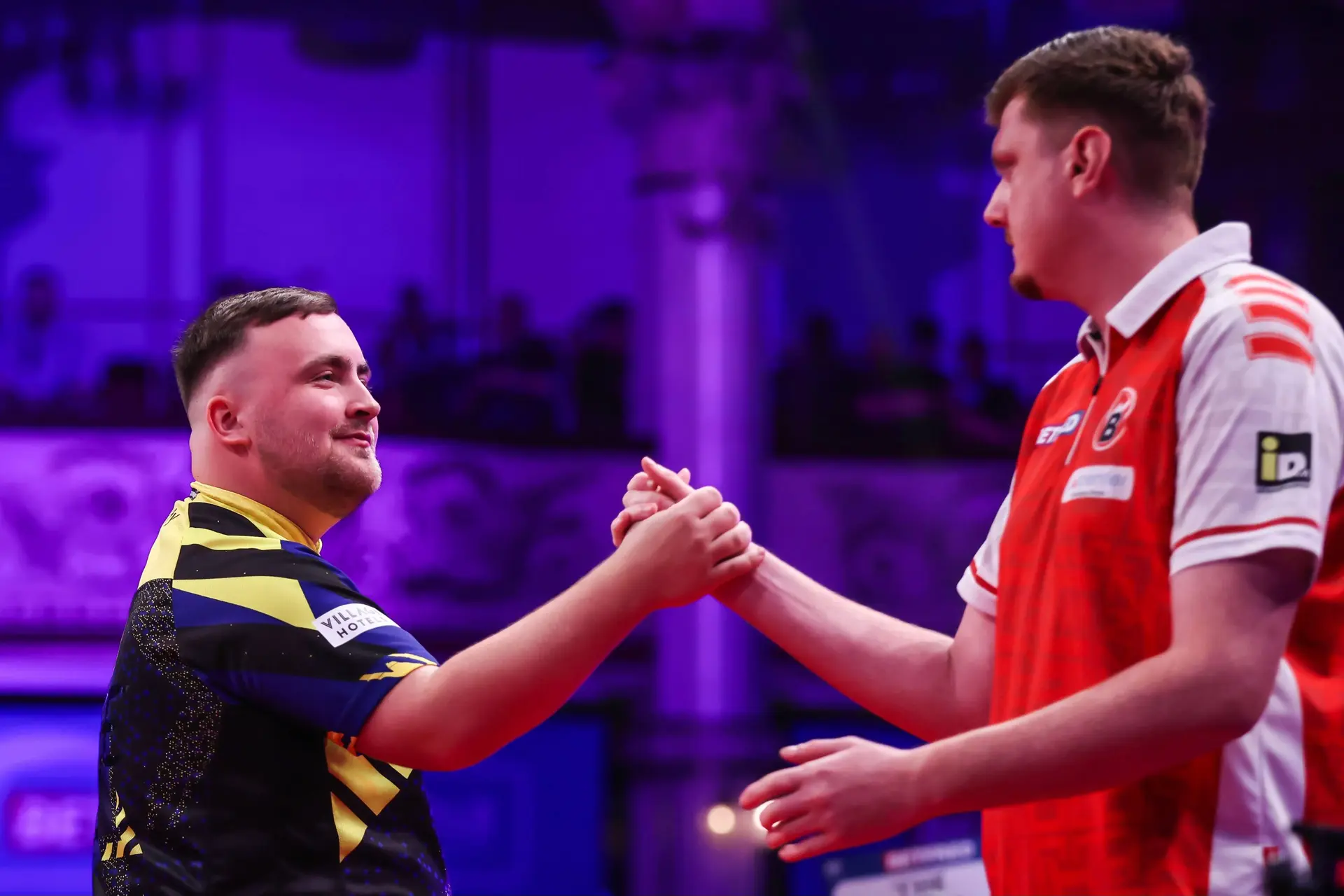 Luke Littler and Niko Springer shake hands at the 2026 World Matchplay