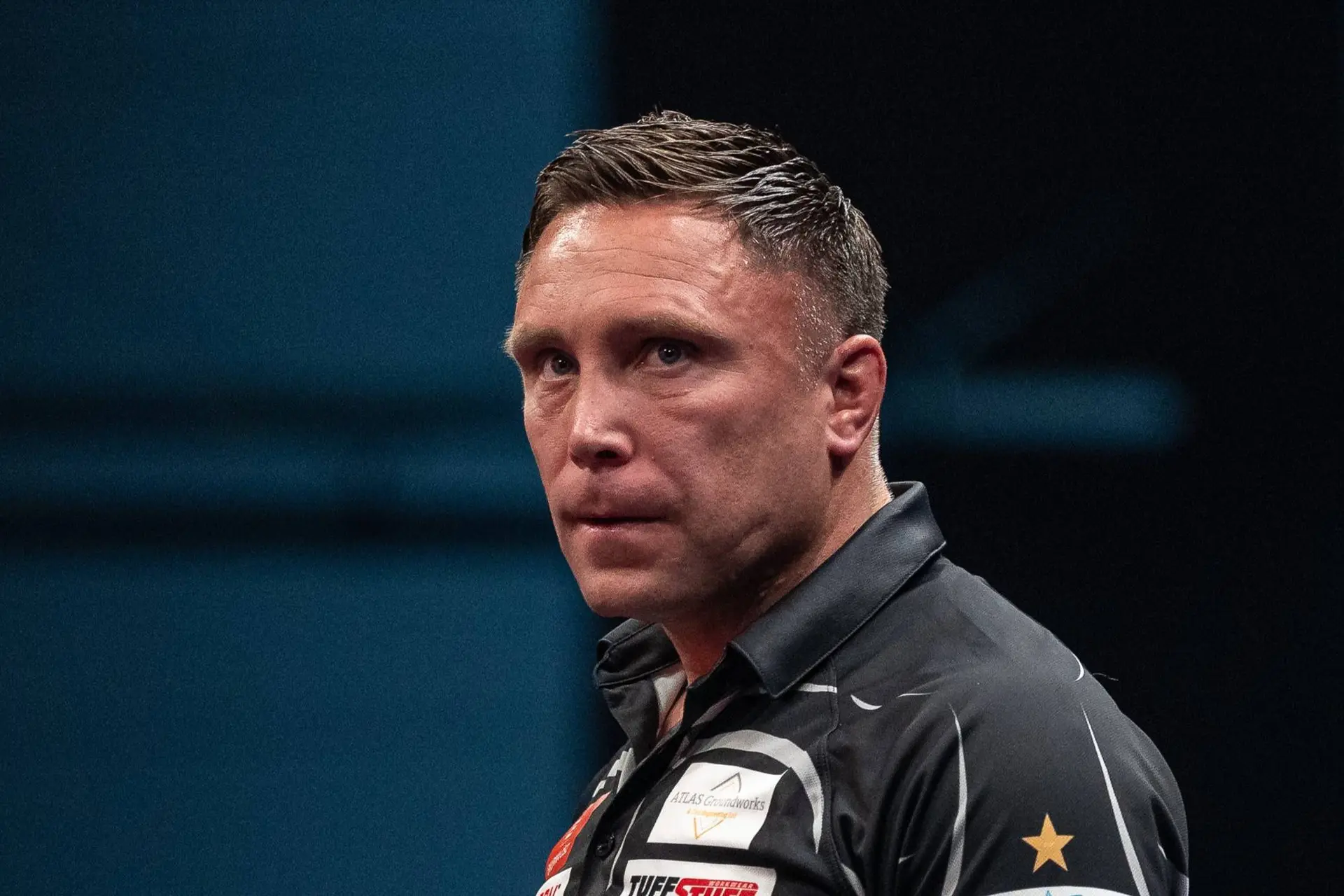 Gerwyn Price looks on