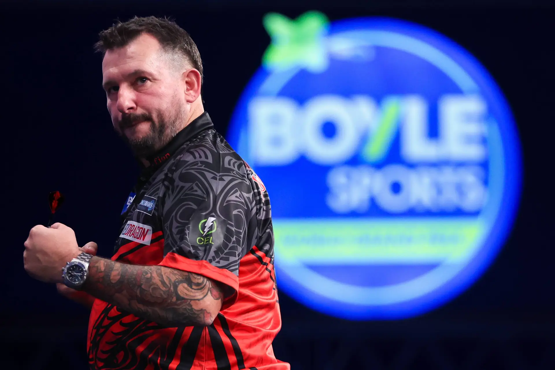 Jonny Clayton pumps his fist at the 2026 World Grand Prix