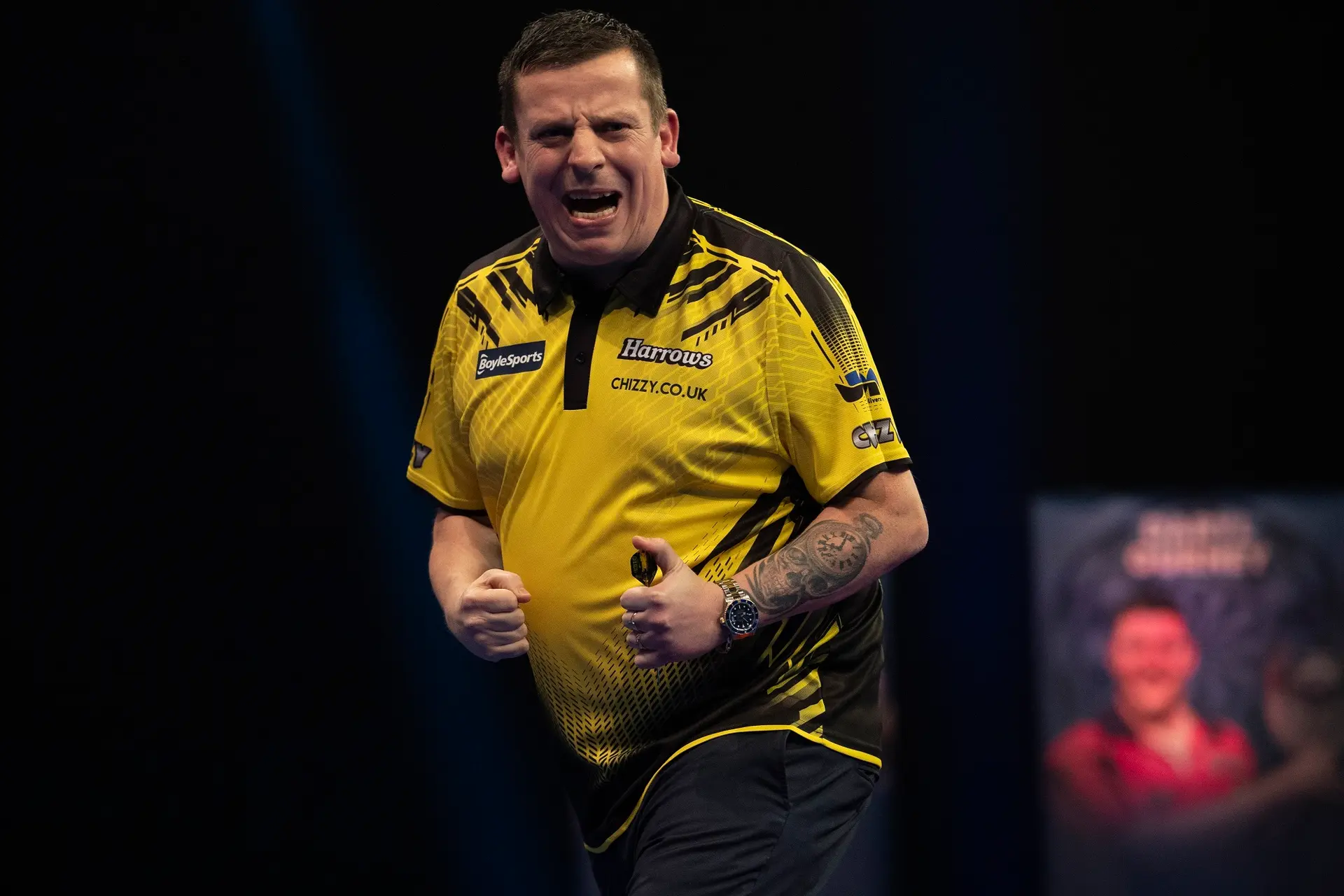 Chisnall survives seven match darts to defeat Joyce and reach World Grand Prix Quarter-Finals