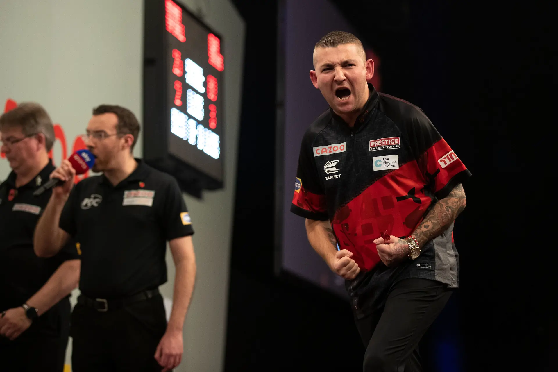Aspinall kickt Wright aus dem Grand Slam of Darts