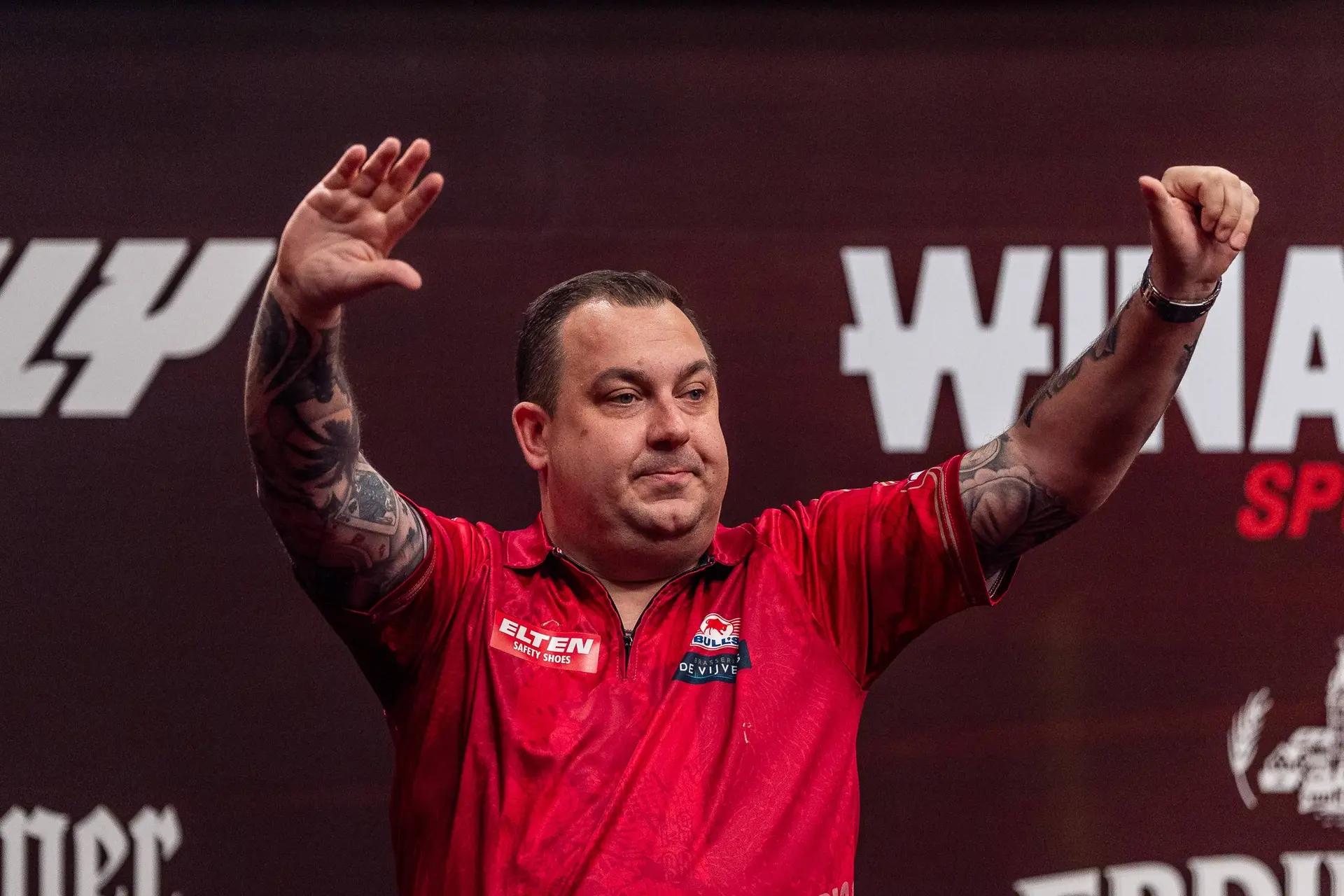 Kim Huybrechts zwaait naar het publiek