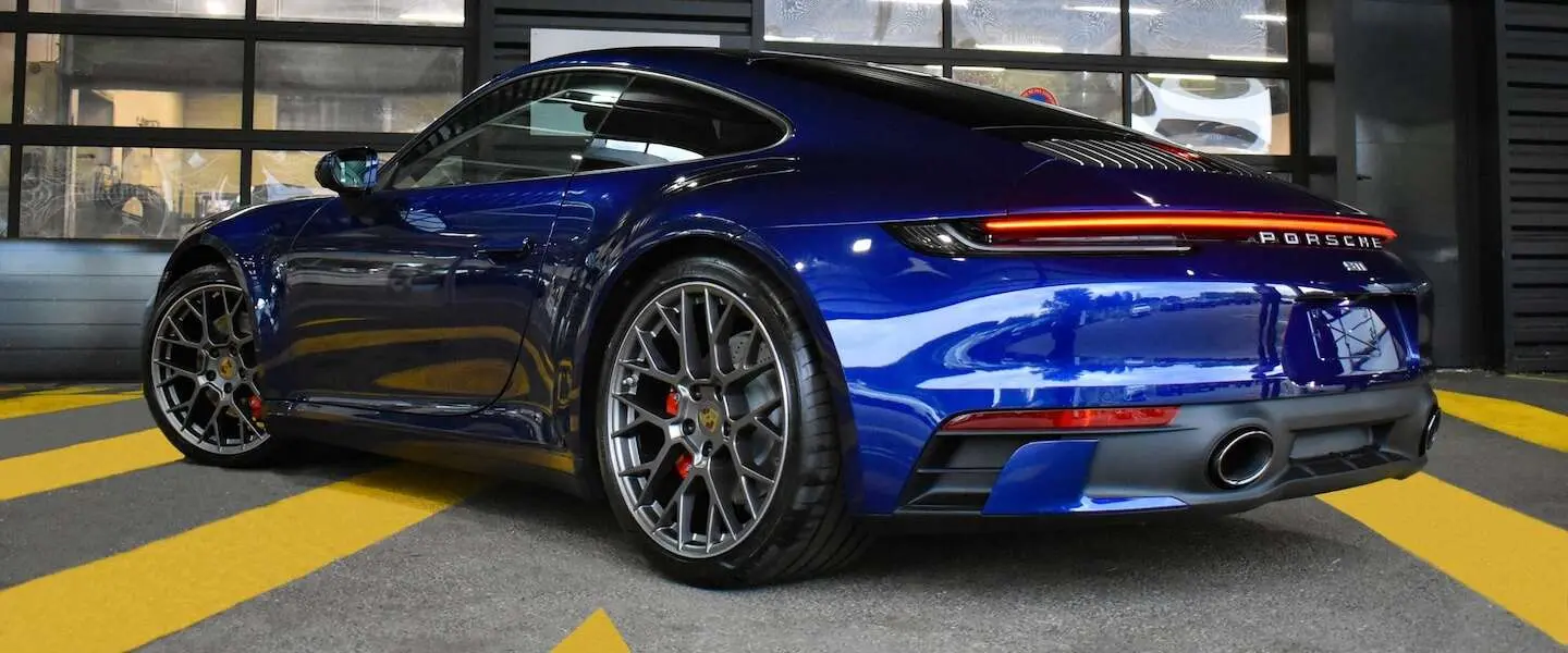 porsche header