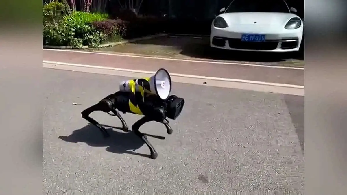newsflare robot dog carrying loudspeaker
