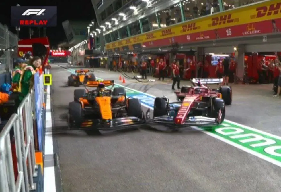 Norris hits pit lane wall after colliding with Leclerc!