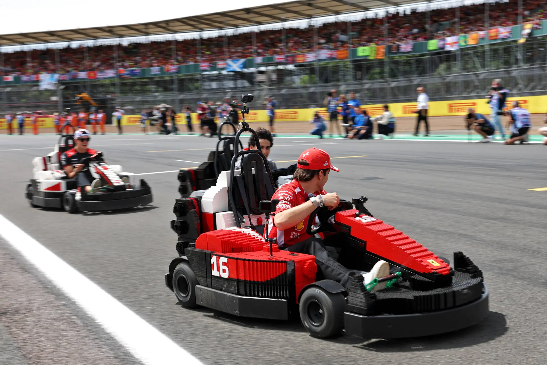 Drivers turn LEGO F1 parade into chaotic show ahead of British GP
