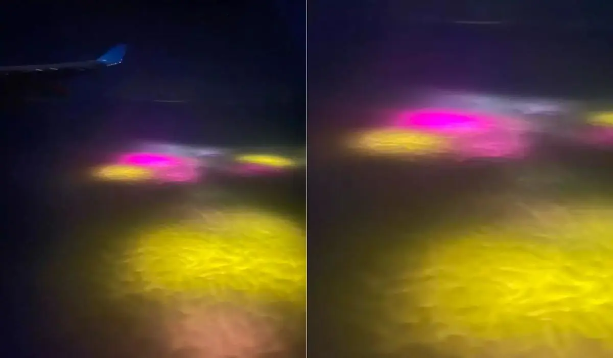 Man ziet mysterieuze lichten in de Atlantische Oceaan vanuit het raam van het vliegtuig tijdens een nachtvlucht