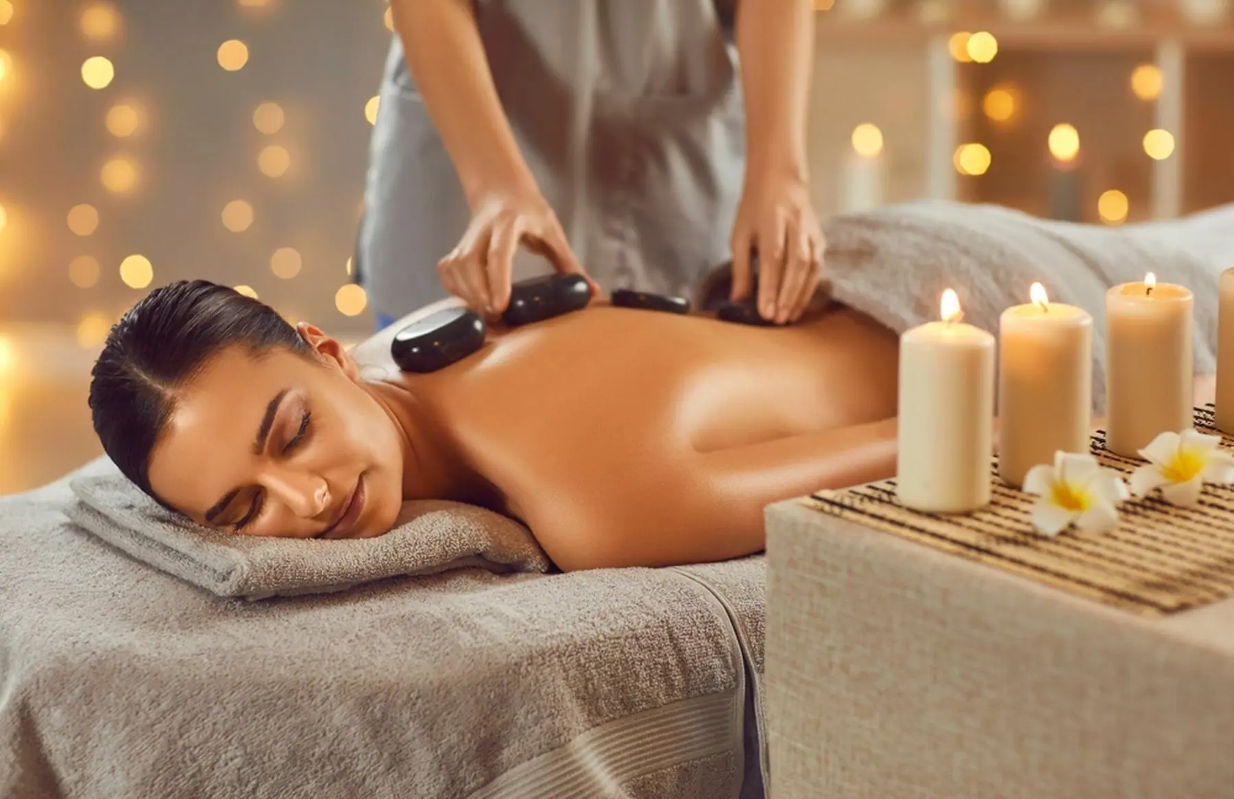 Woman,Enjoying,Exotic,Hot,Stones,Spa,Massage.,Relaxed,Young,Woman