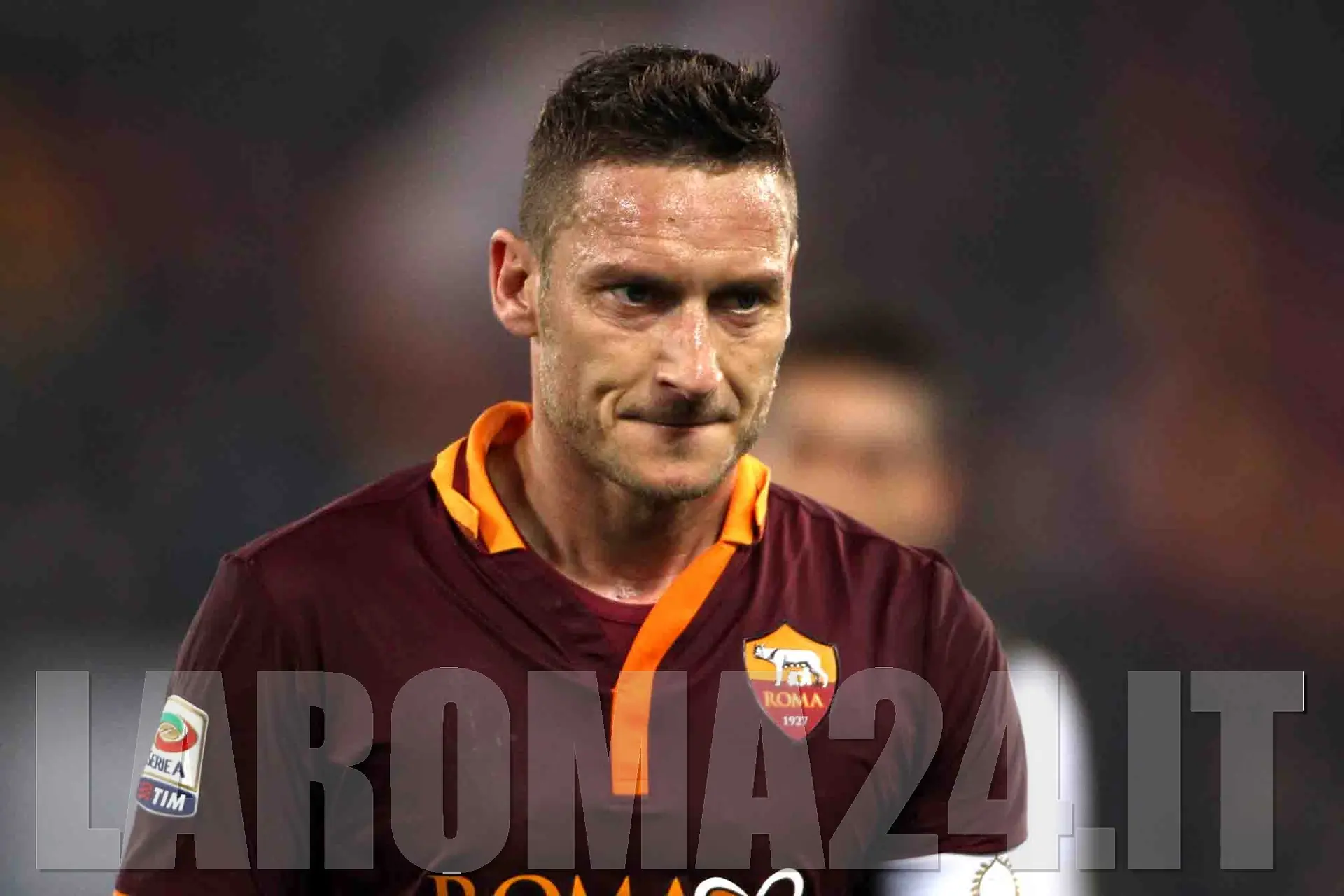 totti primo piano gino
