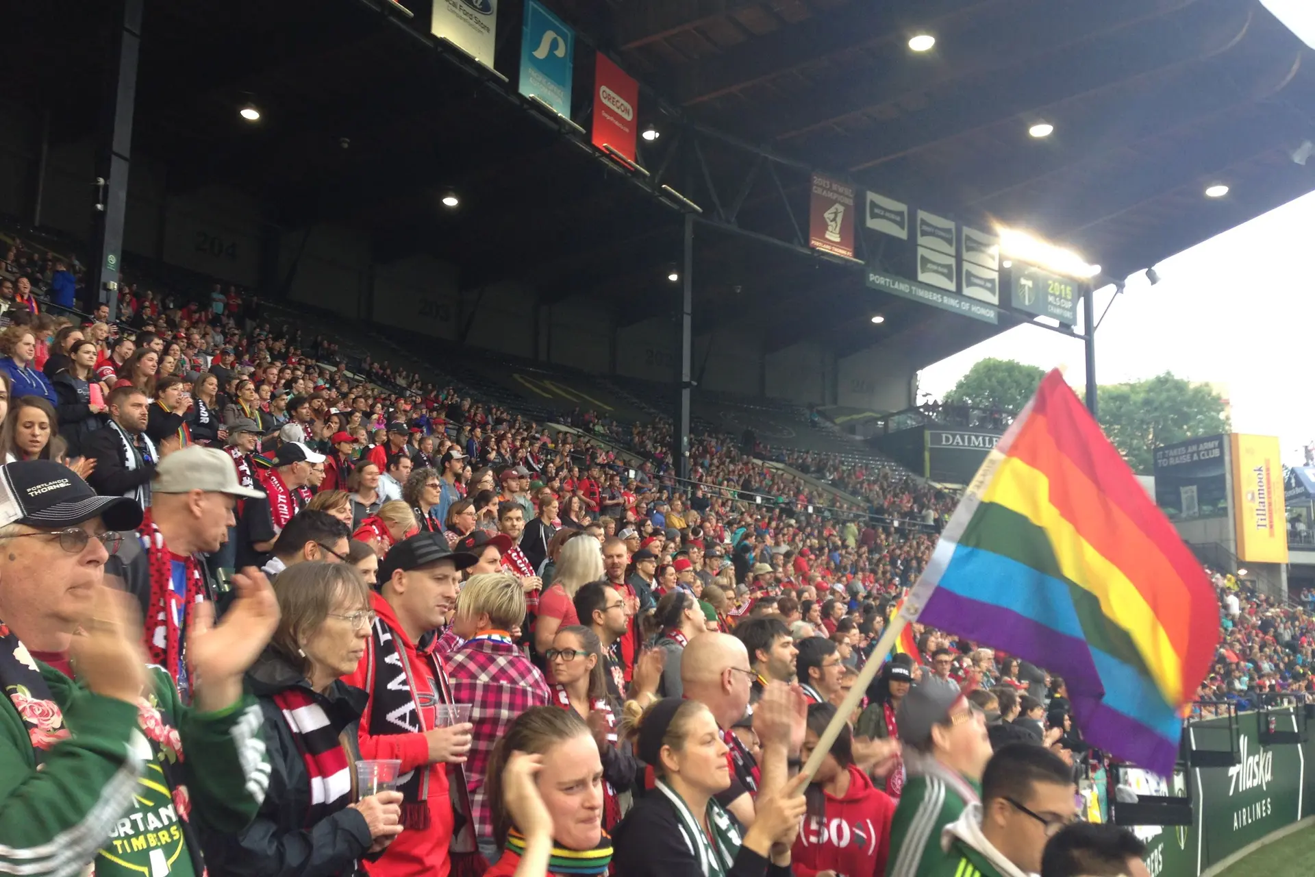 lgbt rainbow pride flag at professional soccer game