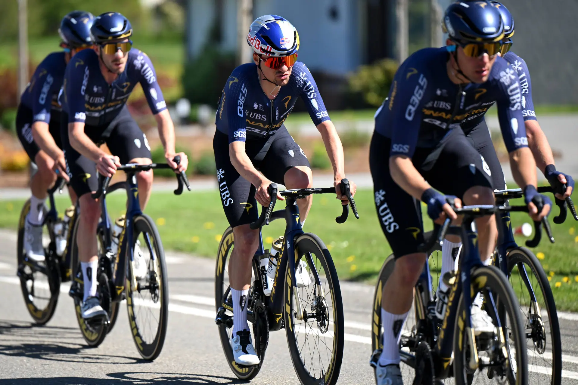 Tom Pidcock surrounded by Q36.5 teammates at Liege-Bastogne-Liege 2026