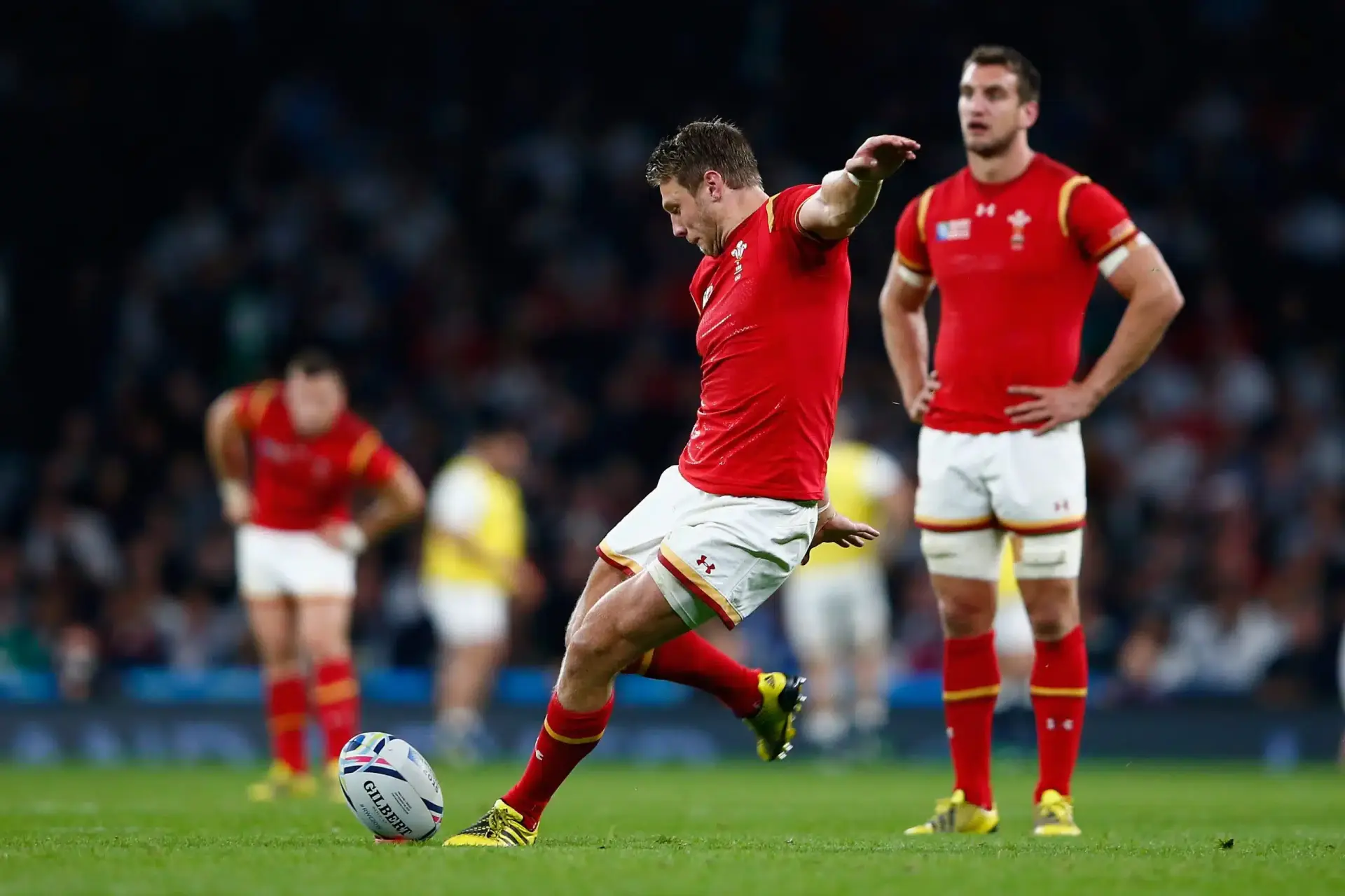 LONDON, ENGLAND - SEPTEMBER 26: Dan Biggar of Wales kicks a penalty during the 2015 Rugby World Cup Pool A match between England and Wales at Twickenham Stadium on September 26, 2015 in London, United Kingdom. (Photo by Shaun Botterill/Getty Images)