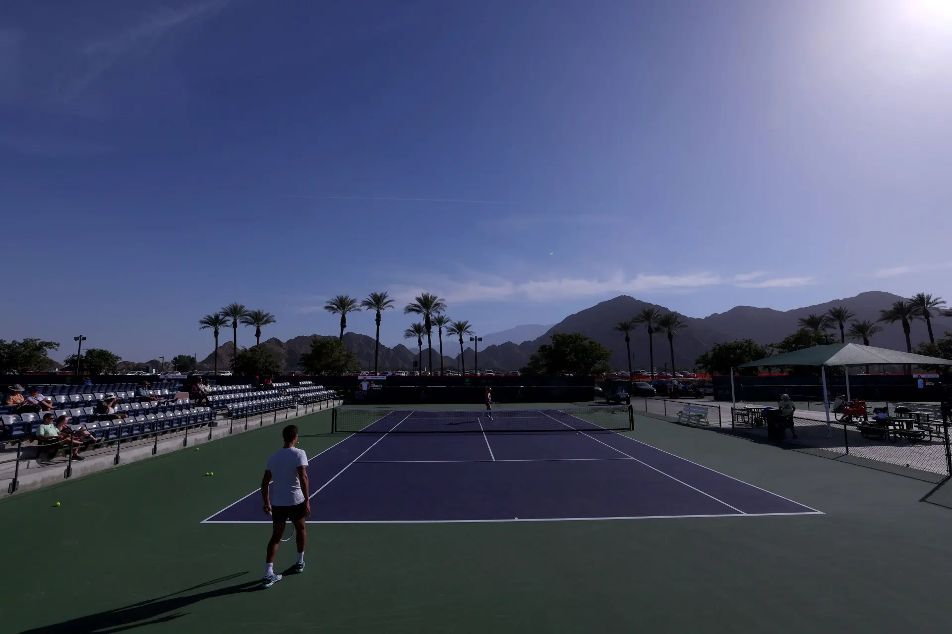 Players competing on tennis court