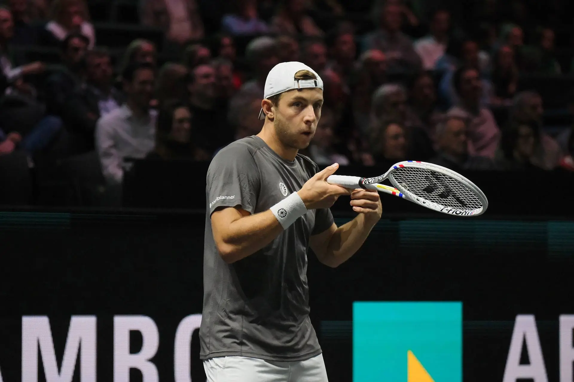 Tallon Griekspoor blows racquet.