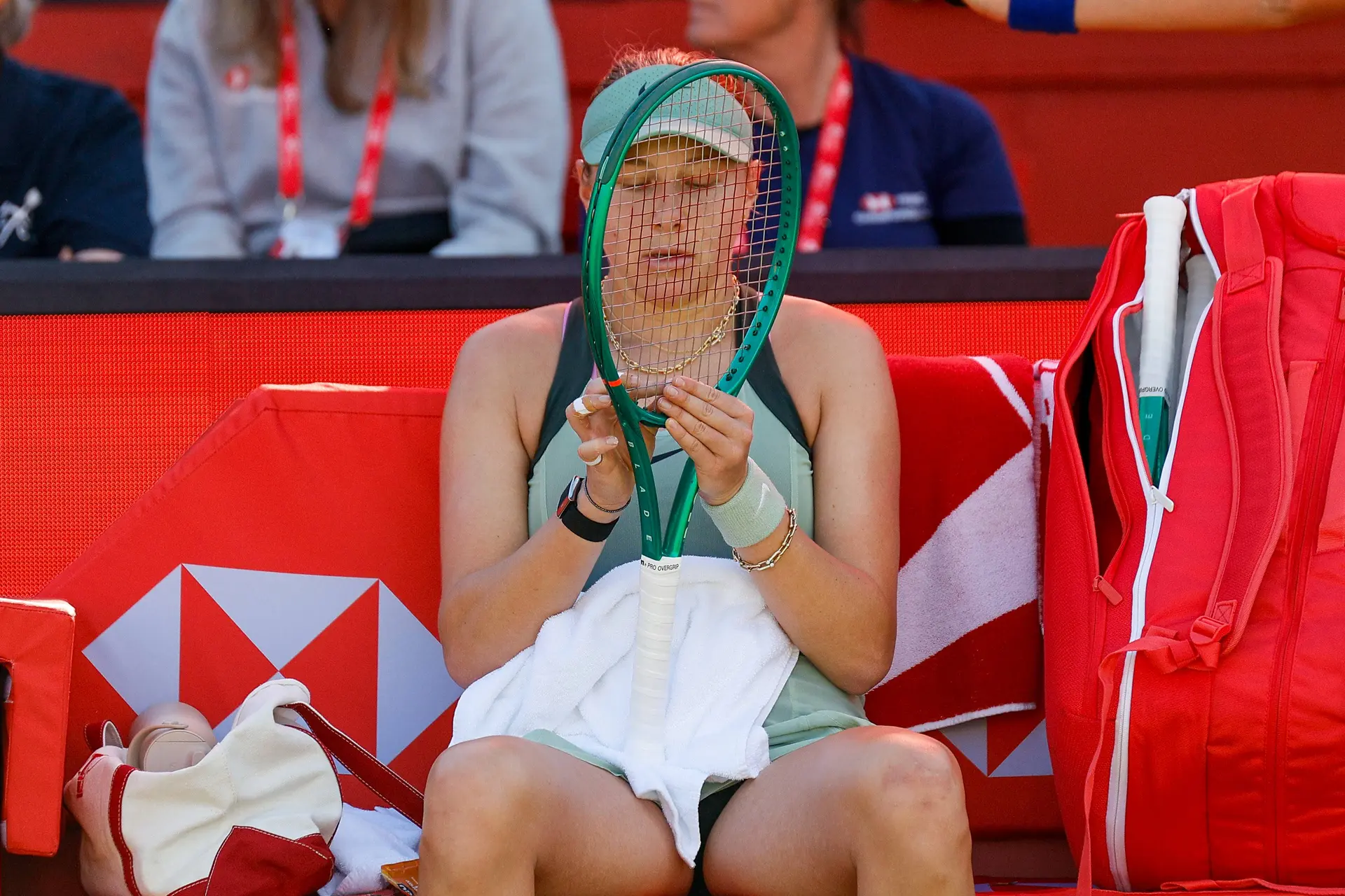 Anisimova holds racquet.