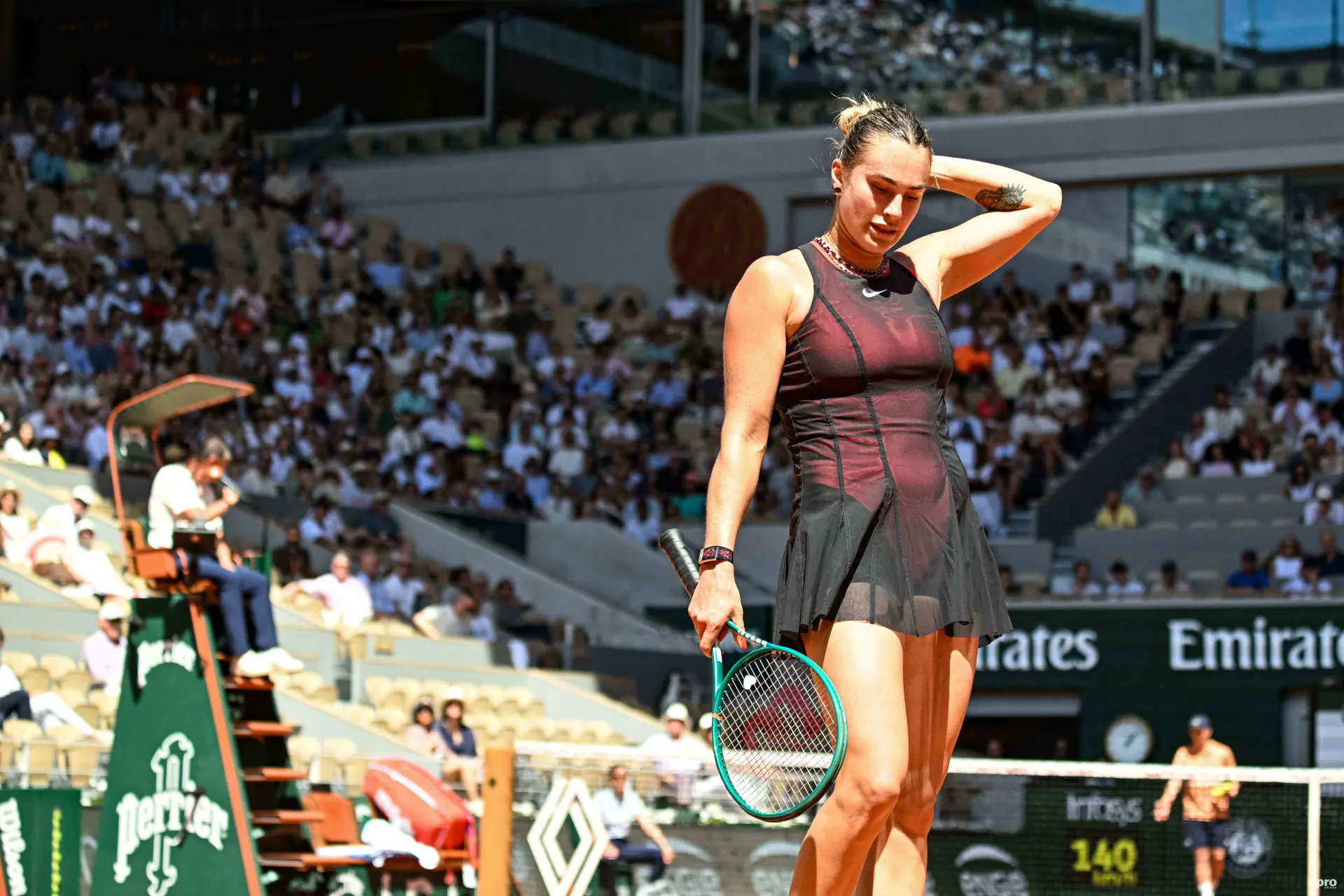 Aryna Sabalenka returns to the baseline.