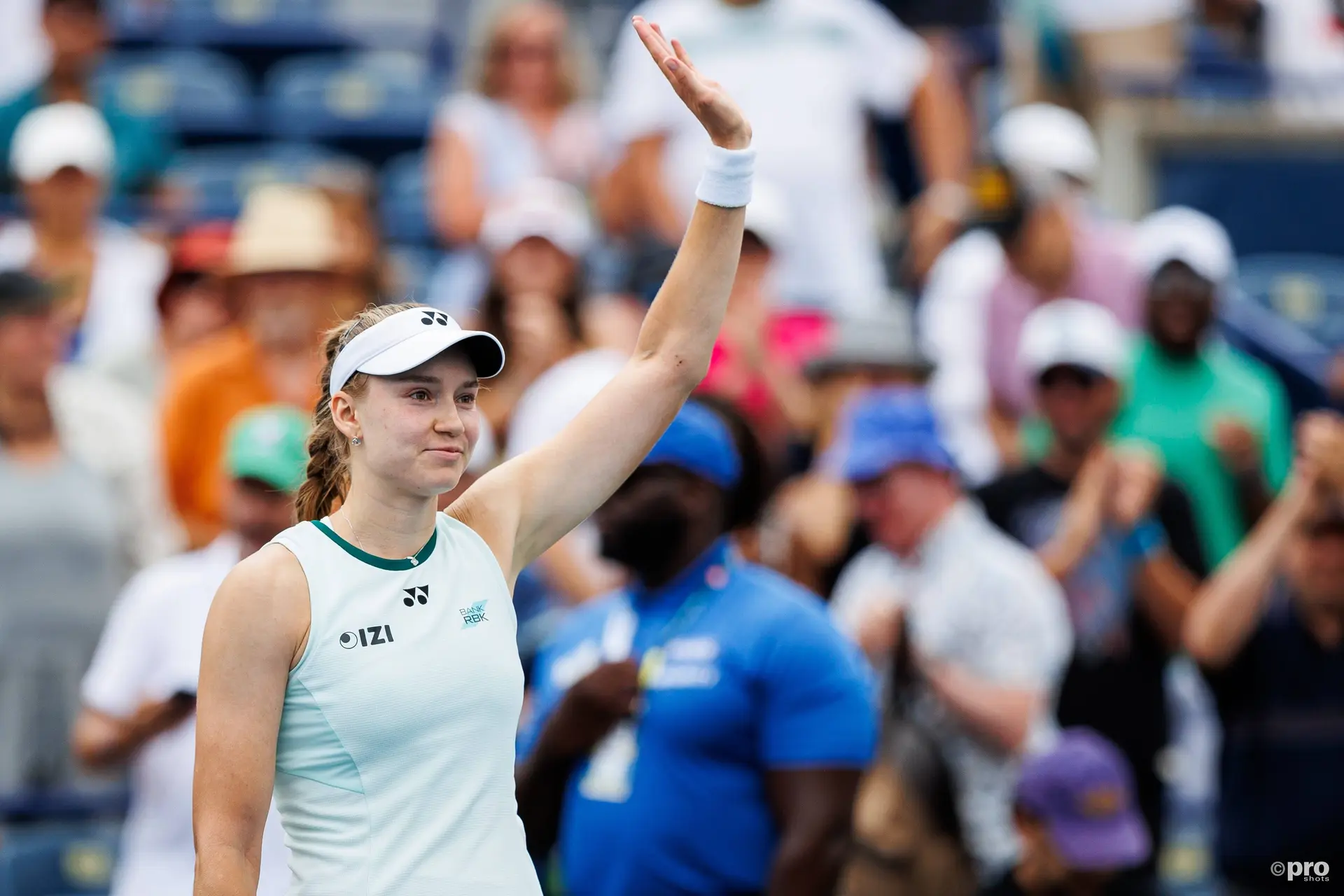 Rybakina raises her arm to greet the crowd after a victory in Toronto