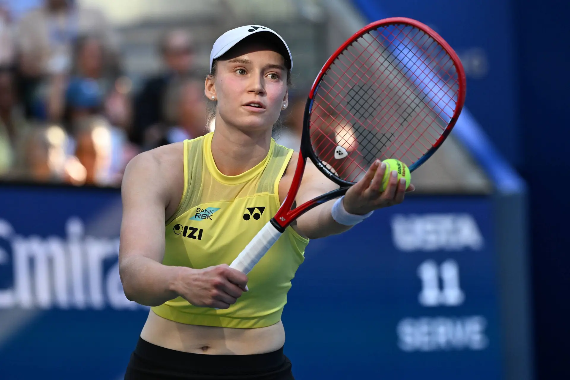 Elena Rybakina serves.
