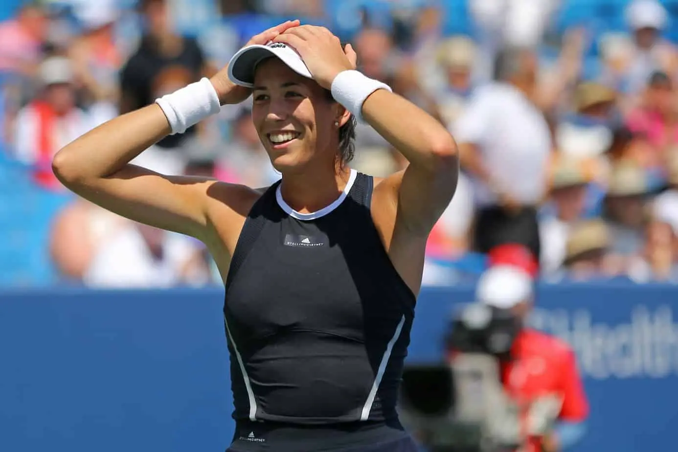 Game, set, match: Garbine MUGURUZA trades tennis for Zumba in unexpected retirement