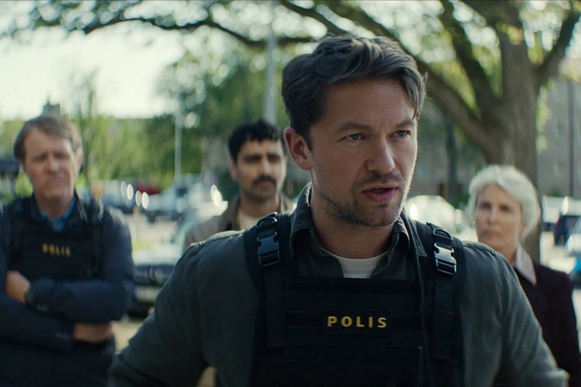 Blodsoffer. Henrik Norlen as Max Abrahamsson and Alexander Abdallah as John-Jo Persson and Jakob Oftebro as Thomas Berg and Irina Björklund as Rebecka Björklund in Blodsoffer. Cr. Courtesy of Netflix © 2025 Jörg