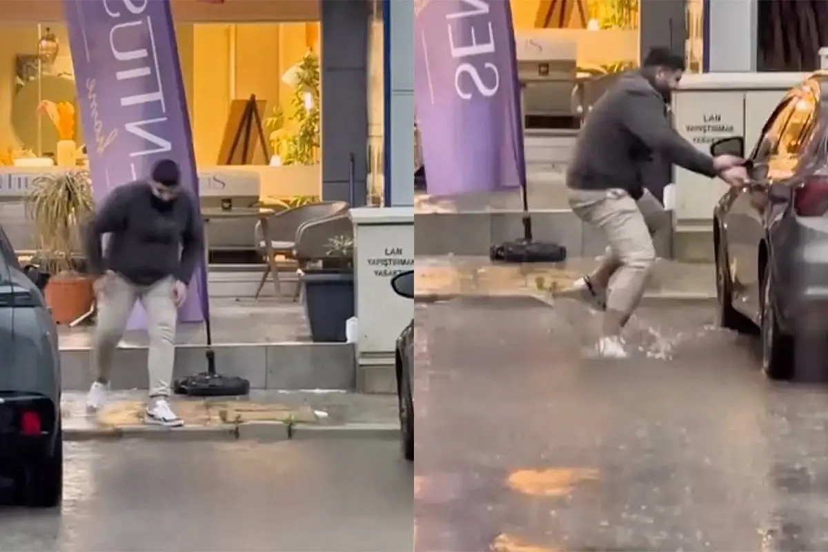 Deze man denkt droog te blijven tijdens stortbui in Turkije… dat loopt anders