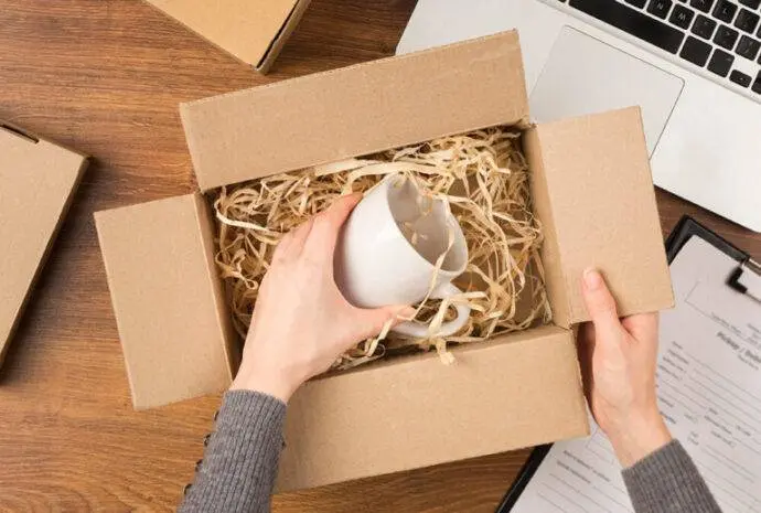 top-view-woman-preparing-cyber-monday-package-1-768x518-690x0-c-default