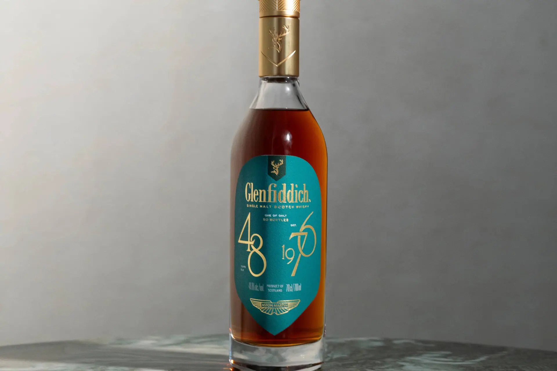 Glenfiddich and Aston Martin Reveal Two Bottles That'll Disappear in the Blink of an Eye