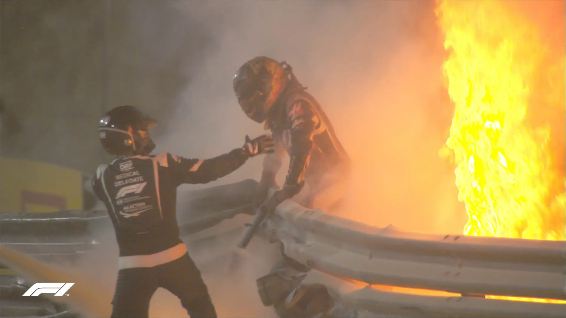 grosjean rescues himself from fire