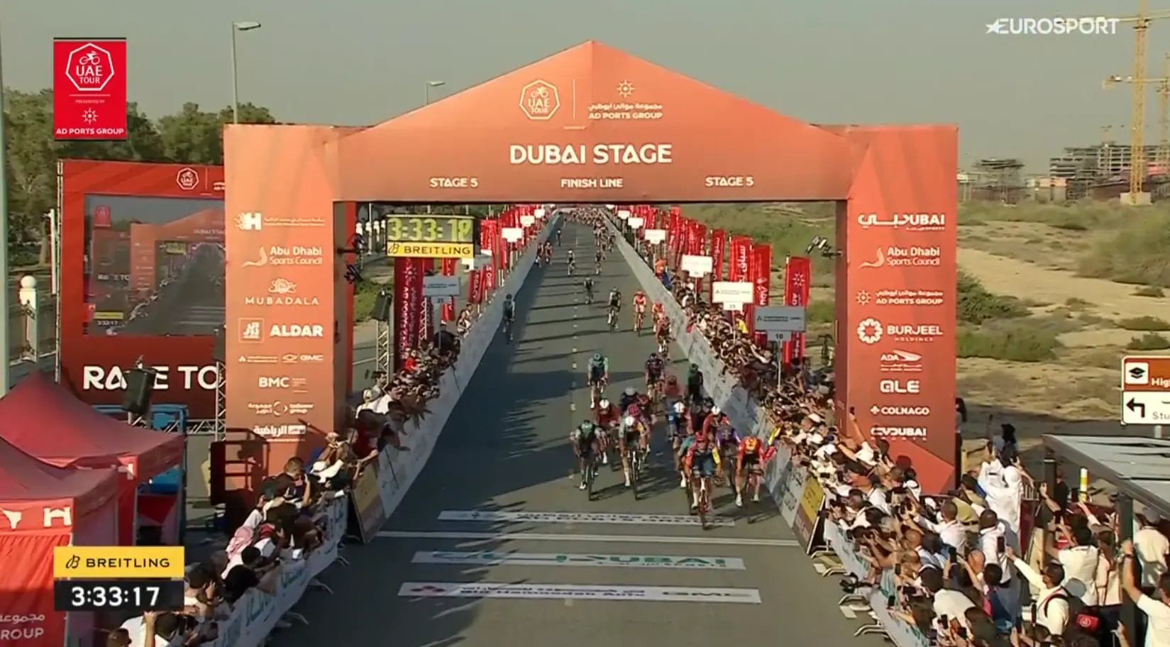 Jonathan Milan wins second straight UAE Tour stage, but sees brother Matteo crash in chaotic sprint