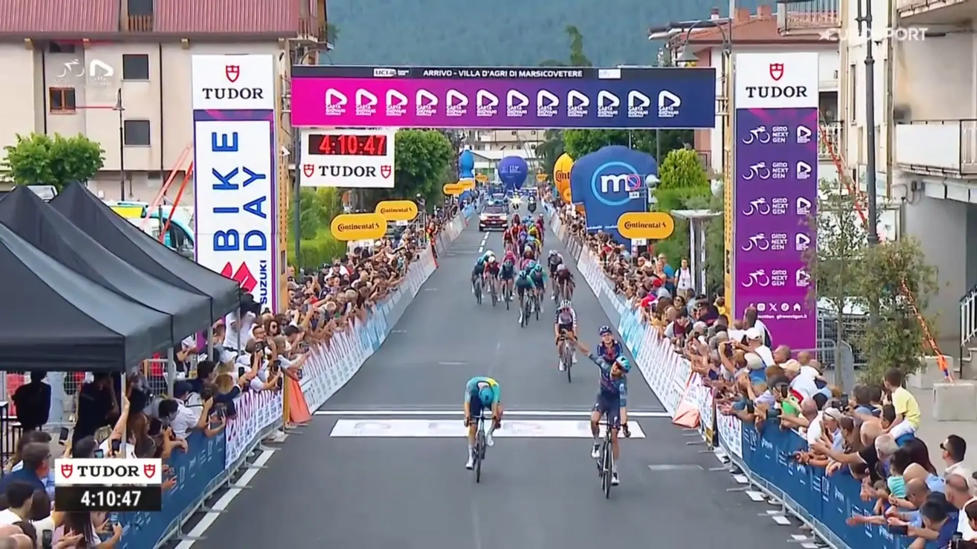 Jasper Schoofs of Soudal Quick-Step holds of peloton to win Giro Next Gen stage 3 and pink jersey