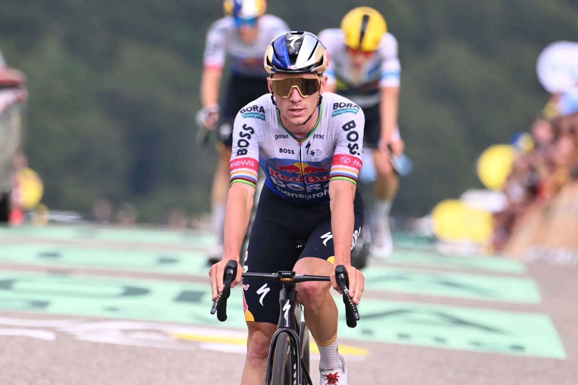 Remco Evenepoel pulls off another near-impossible feat, despite a run-in with a Tour de France race car