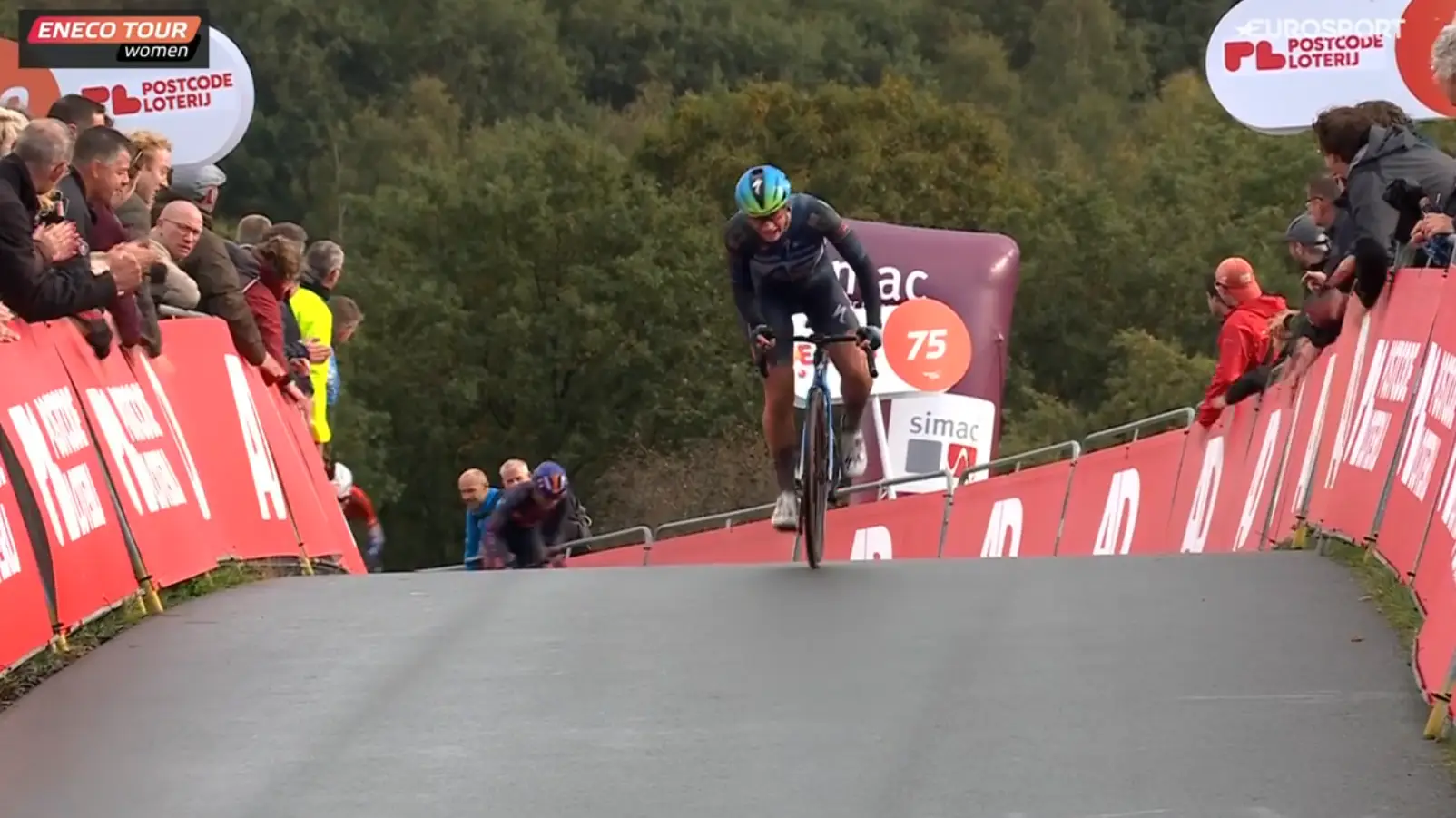 Letizia Borghesi wins stage 4 of the Eneco Tour as wind and rain play havoc on on VAM Mountain
