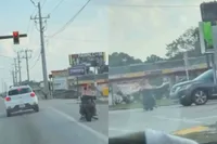 Koppel op mini-bike denkt even door rood te knallen… knalt dan anders