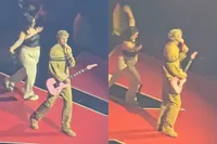 Fan gaat even los op podium bij Machine Gun Kelly… en verdwijnt daarna door een luik