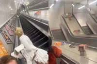 Amateur stuntman trotseert op pijnlijke wijze een roltrap in de London Underground