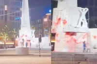 Nieuwe beelden tonen hoe Nationaal Monument op de Dam wordt beklad met rode verf
