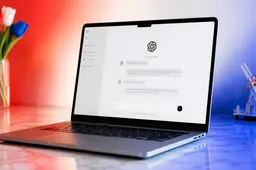 ChatGPT open on a silver MacBook surrounded by red, white and blue lighting inspired by the Dutch flag.