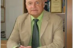 Rajono garbės piliečio vardas suteiktas neurochirurgui